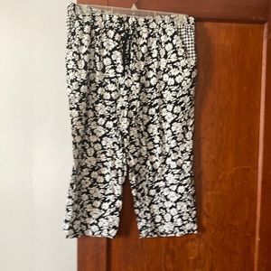 Lounge bottom, large, black and white flowers, black and white plaid pockets.